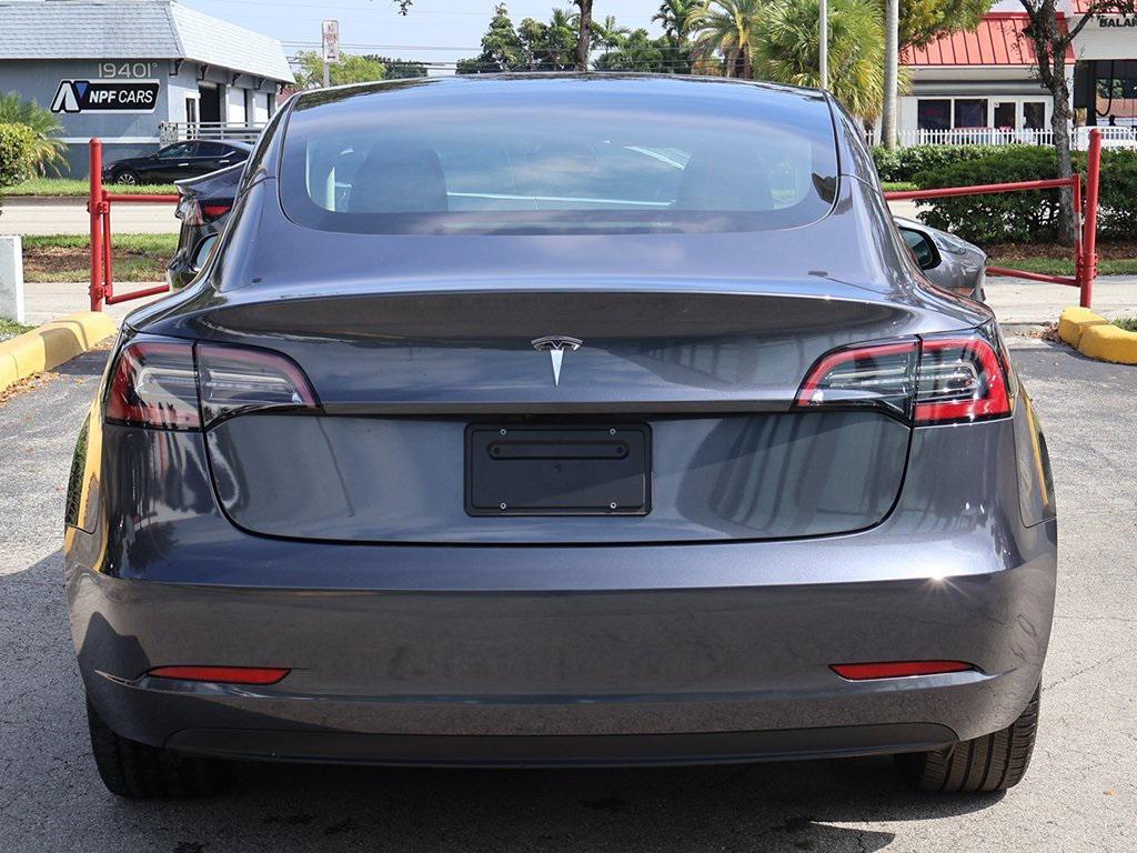 used 2023 Tesla Model 3 car, priced at $23,495