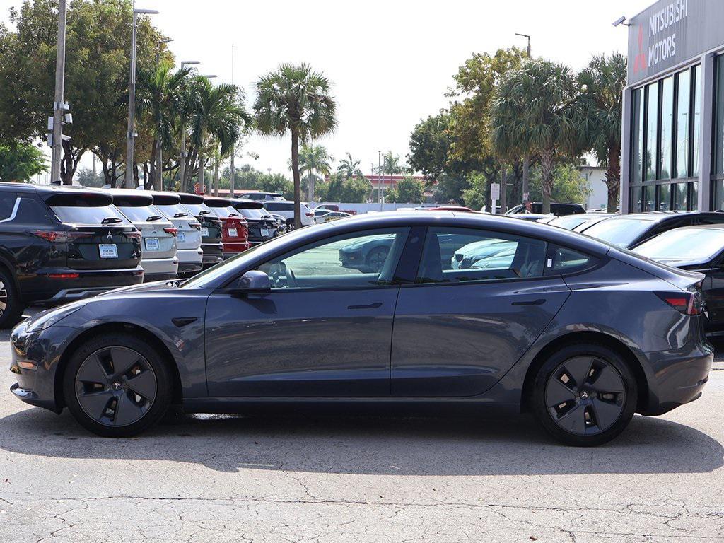 used 2023 Tesla Model 3 car, priced at $23,495