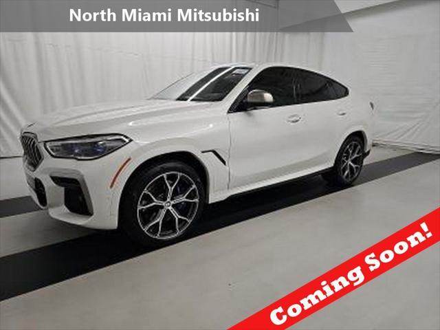 used 2022 BMW X6 car, priced at $64,890