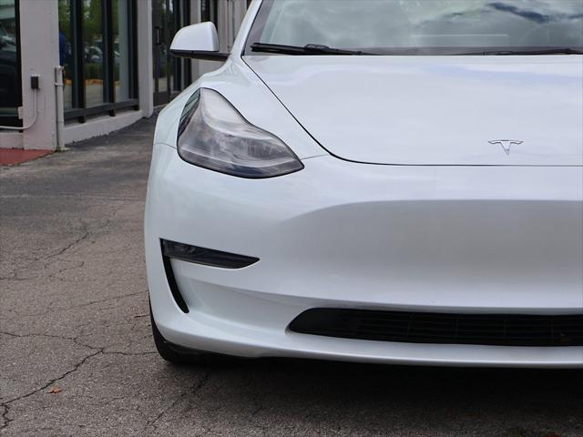 used 2023 Tesla Model 3 car, priced at $25,000