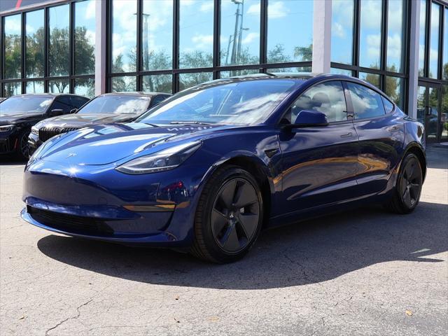 used 2023 Tesla Model 3 car, priced at $25,490