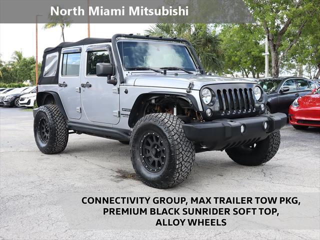 used 2016 Jeep Wrangler Unlimited car, priced at $18,690