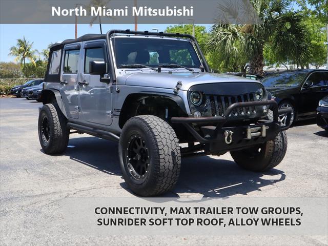 used 2016 Jeep Wrangler Unlimited car, priced at $19,490