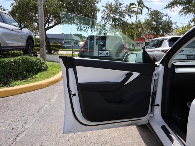 used 2022 Tesla Model Y car, priced at $27,290