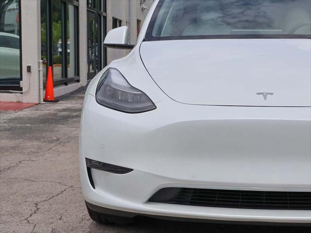used 2022 Tesla Model Y car, priced at $28,590