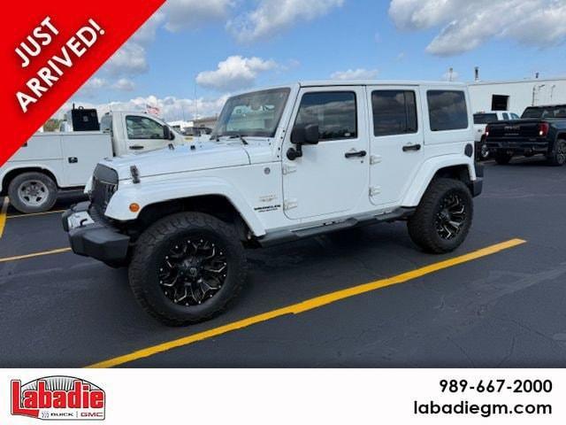 used 2013 Jeep Wrangler Unlimited car, priced at $18,017