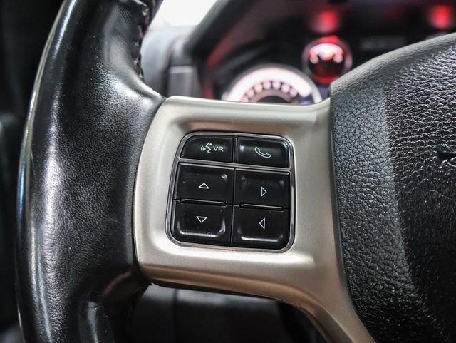 used 2018 Ram 1500 car, priced at $25,040