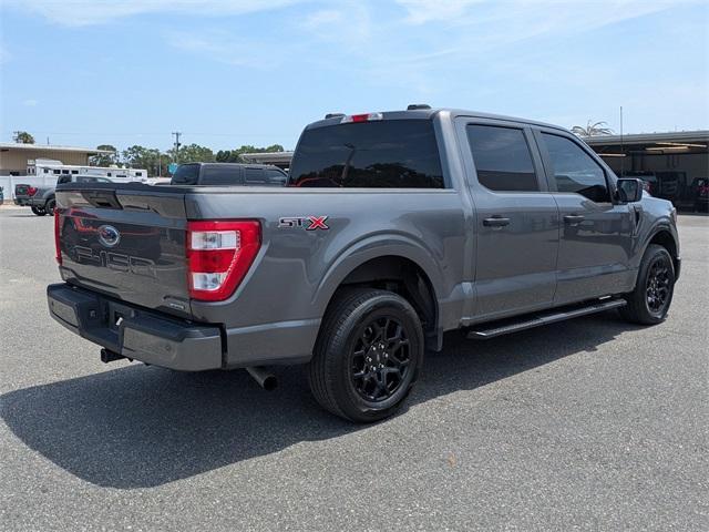 used 2023 Ford F-150 car, priced at $30,143