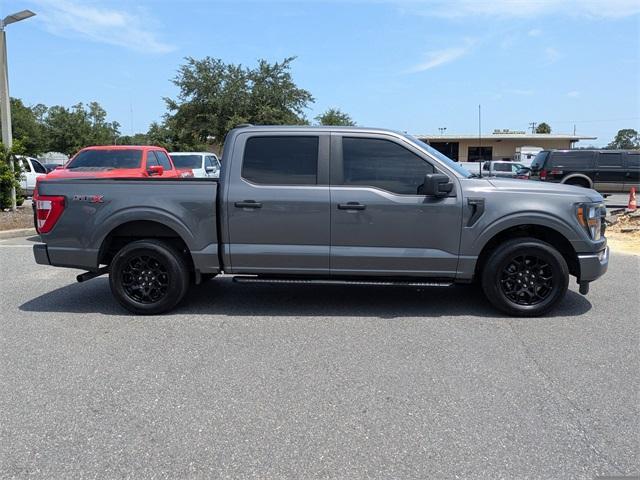 used 2023 Ford F-150 car, priced at $30,143