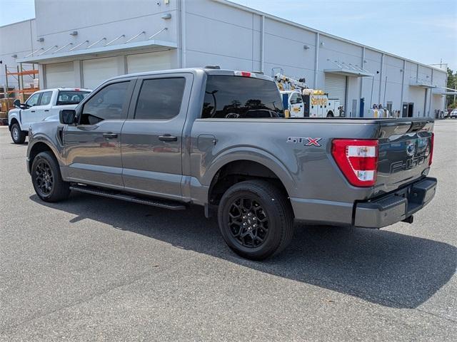 used 2023 Ford F-150 car, priced at $30,143