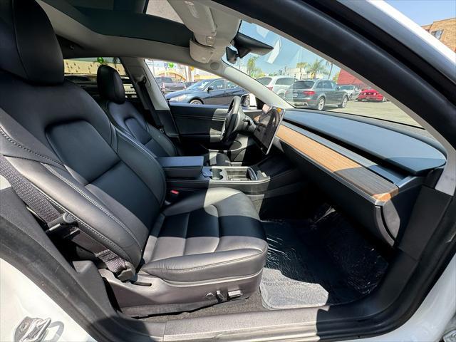 used 2021 Tesla Model 3 car, priced at $27,990