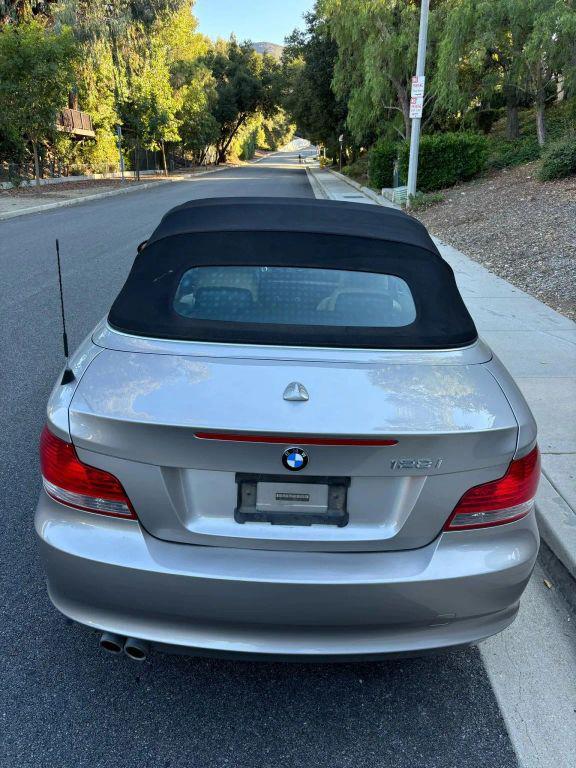 used 2009 BMW 128 car, priced at $11,999