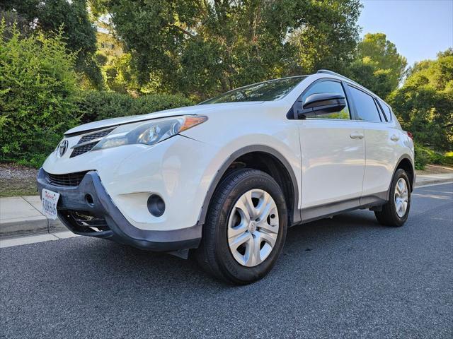 used 2015 Toyota RAV4 car, priced at $11,999