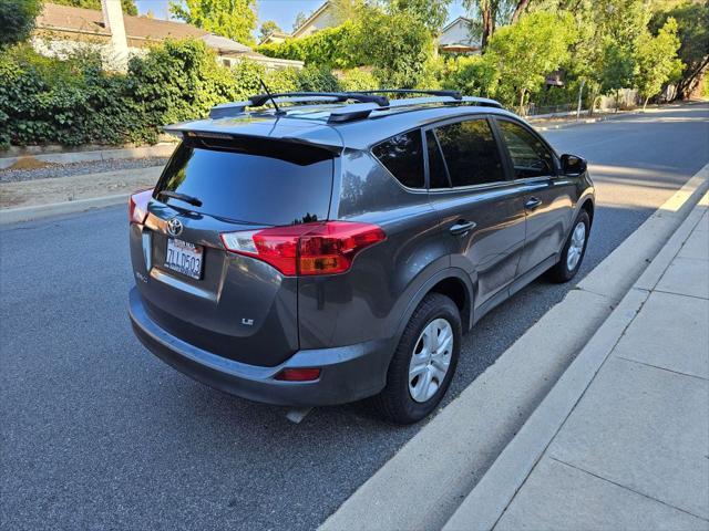 used 2015 Toyota RAV4 car, priced at $15,999