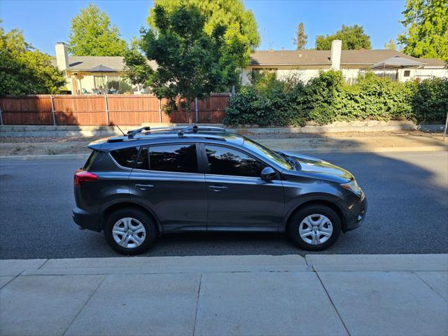 used 2015 Toyota RAV4 car, priced at $15,999