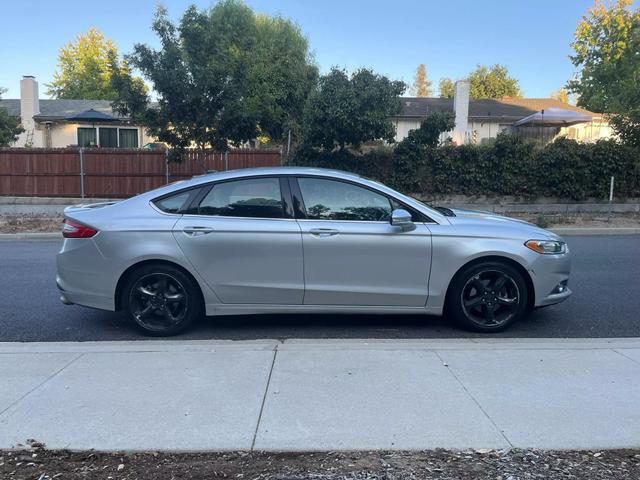 used 2013 Ford Fusion car, priced at $5,999