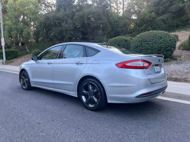 used 2013 Ford Fusion car, priced at $5,999