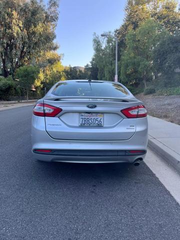 used 2013 Ford Fusion car, priced at $5,999