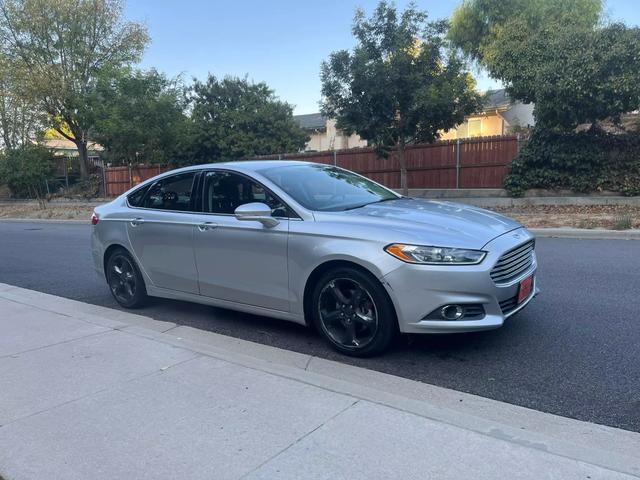 used 2013 Ford Fusion car, priced at $5,999