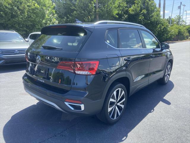used 2022 Volkswagen Taos car, priced at $22,999