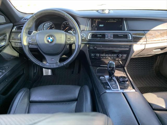 used 2014 BMW 750 car, priced at $14,999