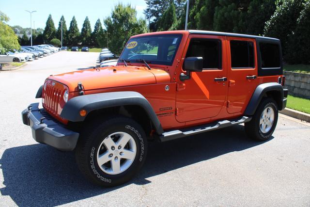 used 2015 Jeep Wrangler Unlimited car, priced at $18,499