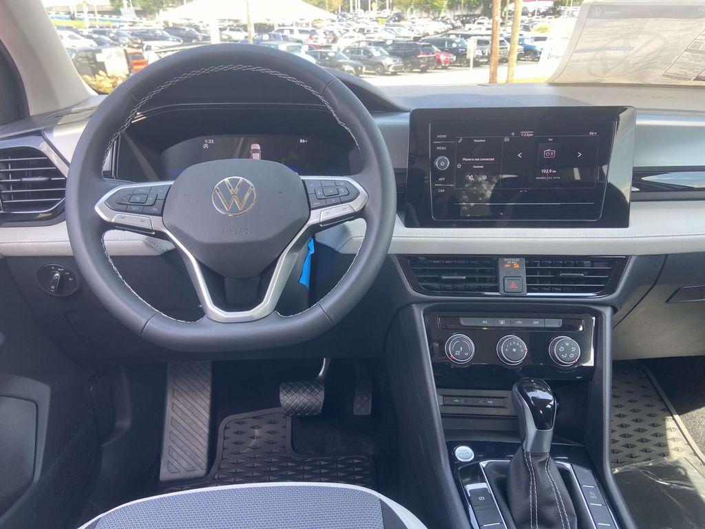new 2025 Volkswagen Taos car, priced at $27,216