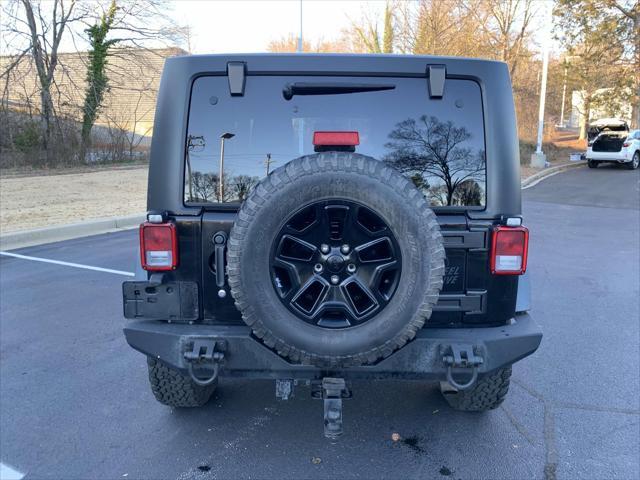 used 2015 Jeep Wrangler car, priced at $16,999