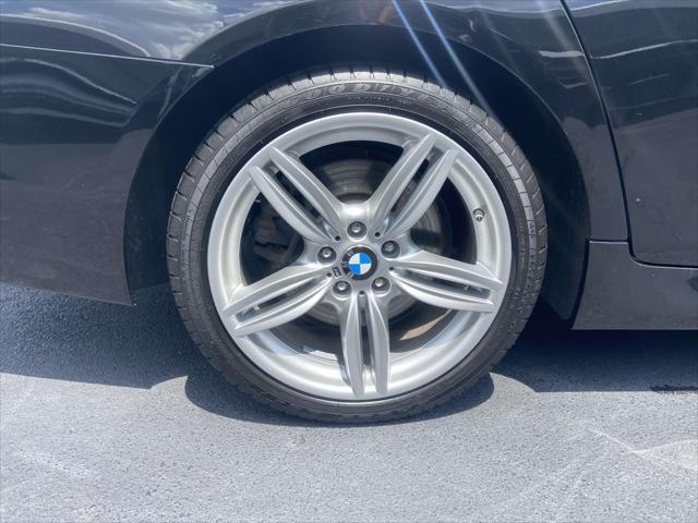 used 2015 BMW 550 car, priced at $16,999