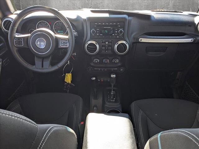 used 2015 Jeep Wrangler Unlimited car, priced at $25,491