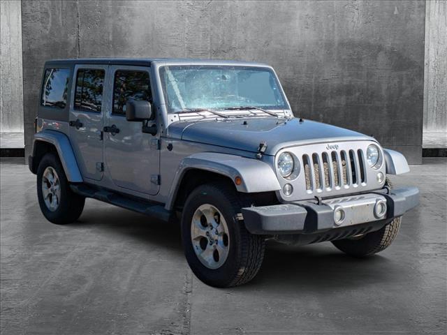 used 2014 Jeep Wrangler Unlimited car, priced at $12,498