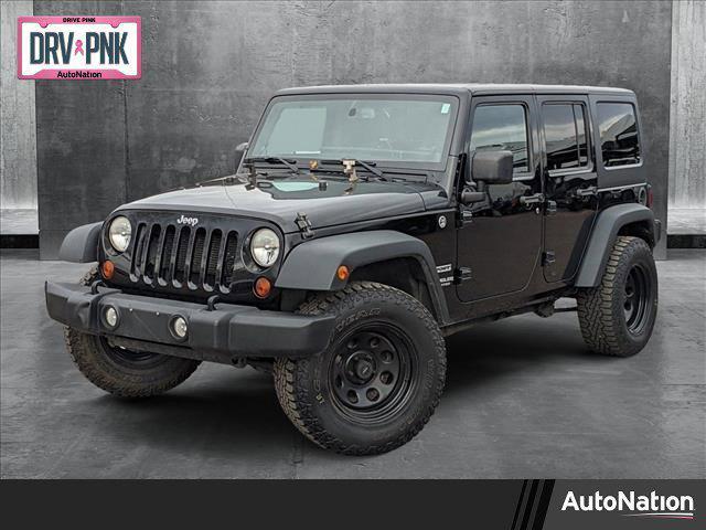 used 2013 Jeep Wrangler Unlimited car, priced at $12,998