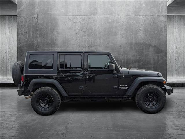 used 2013 Jeep Wrangler Unlimited car, priced at $12,998