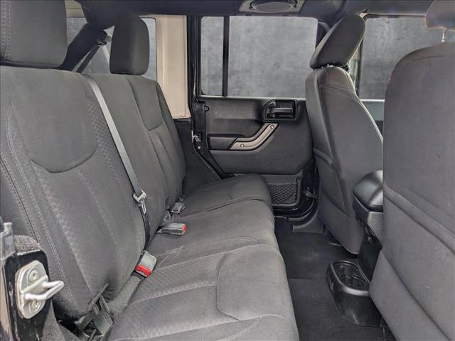 used 2013 Jeep Wrangler Unlimited car, priced at $12,998