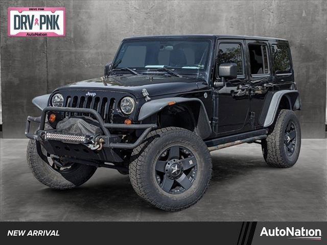 used 2012 Jeep Wrangler Unlimited car, priced at $16,990