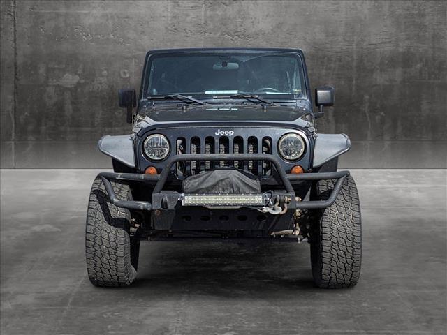 used 2012 Jeep Wrangler Unlimited car, priced at $15,991