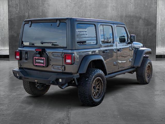 used 2022 Jeep Wrangler Unlimited car, priced at $34,590