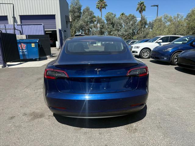 used 2018 Tesla Model 3 car, priced at $13,999