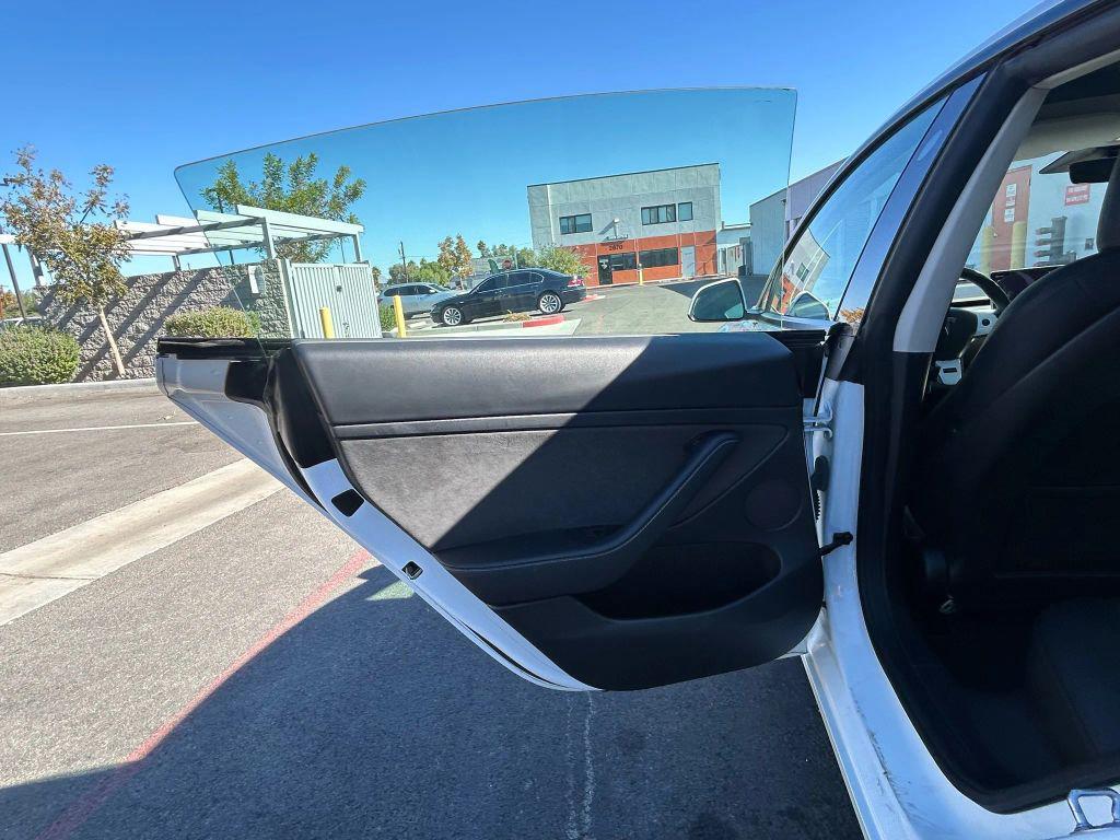 used 2022 Tesla Model 3 car, priced at $17,999