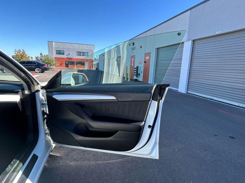 used 2022 Tesla Model 3 car, priced at $17,999