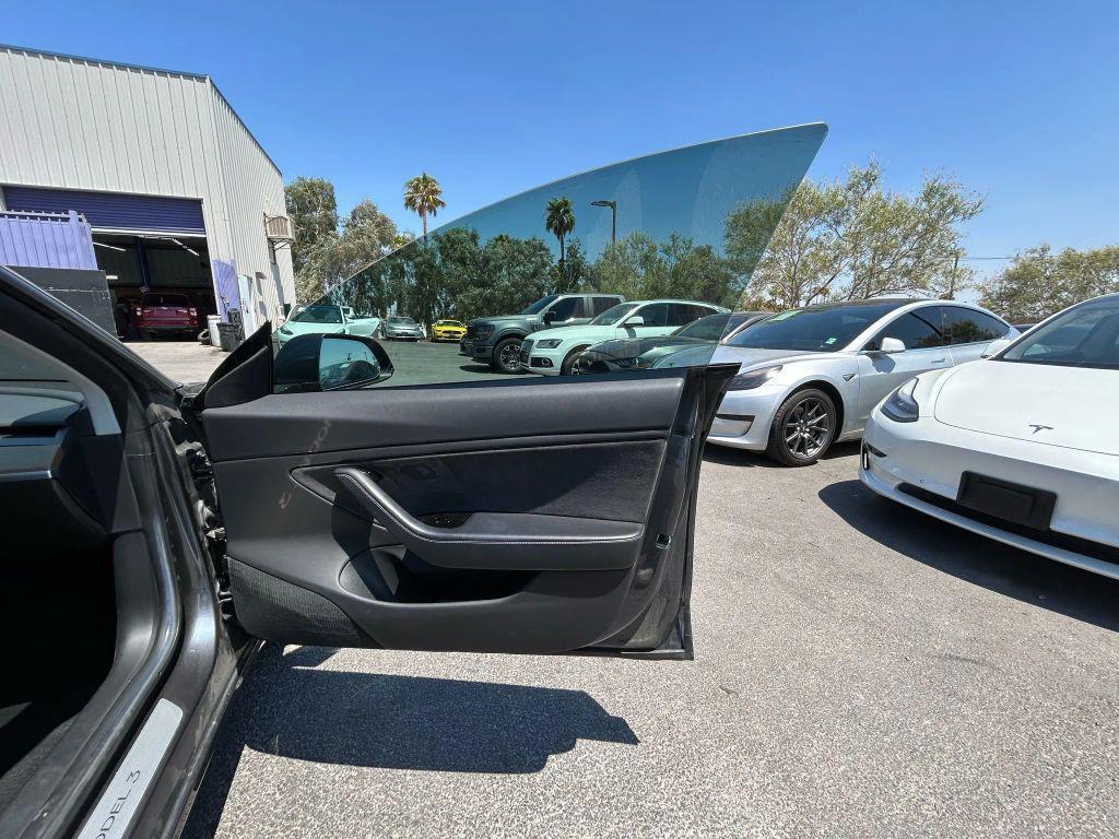 used 2018 Tesla Model 3 car, priced at $13,999