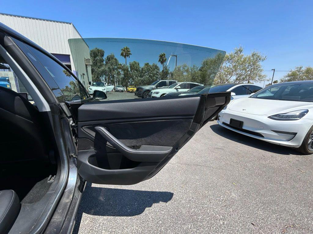 used 2018 Tesla Model 3 car, priced at $13,999