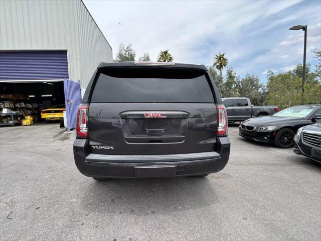 used 2015 GMC Yukon car, priced at $14,999