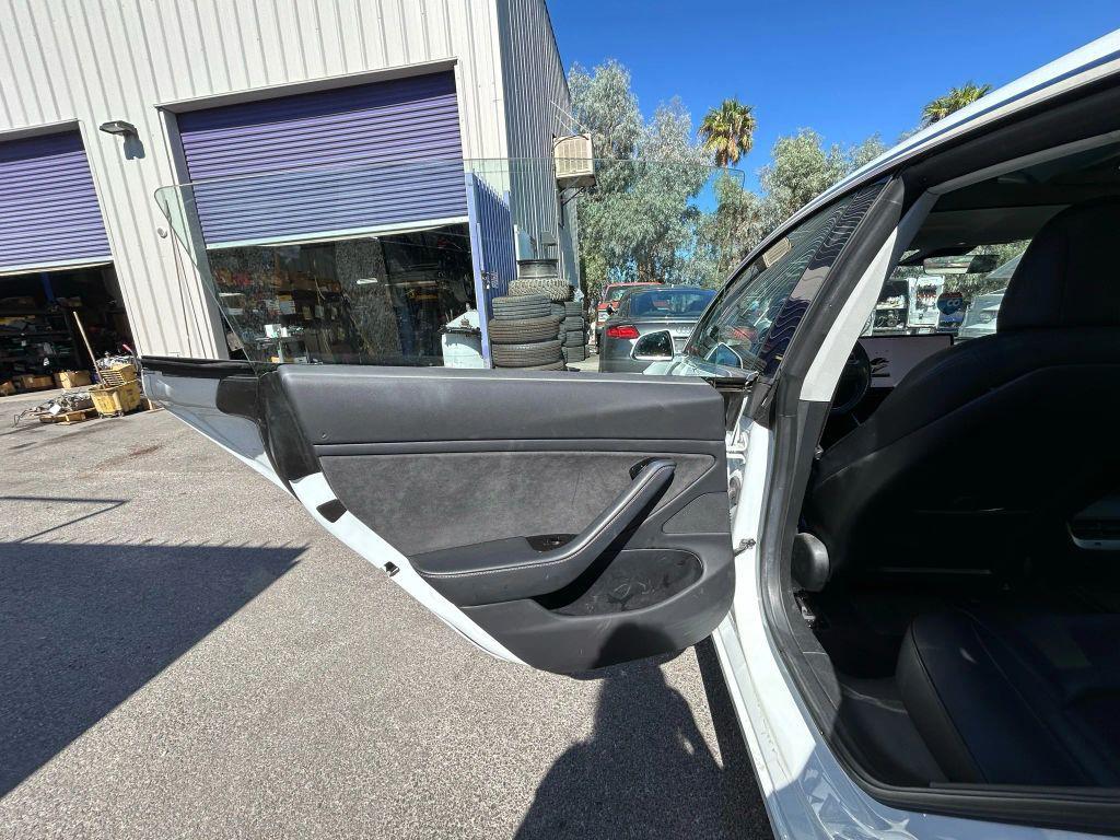 used 2018 Tesla Model 3 car, priced at $18,888