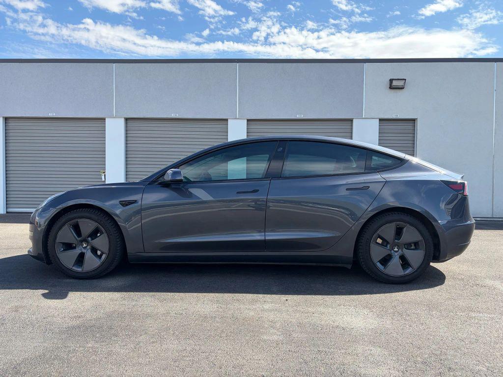 used 2021 Tesla Model 3 car, priced at $15,999