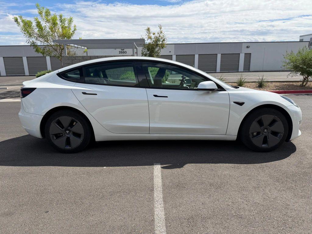 used 2023 Tesla Model 3 car, priced at $22,736