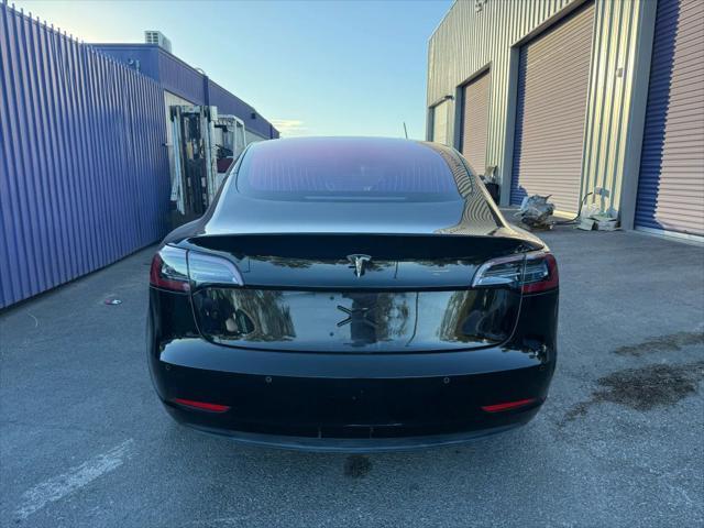 used 2018 Tesla Model 3 car, priced at $13,999