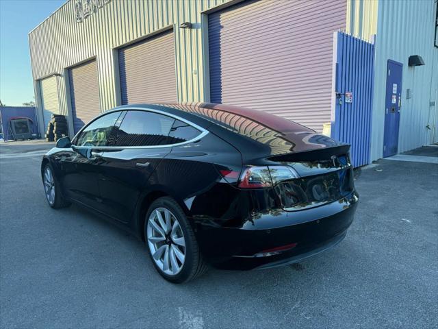 used 2018 Tesla Model 3 car, priced at $13,999