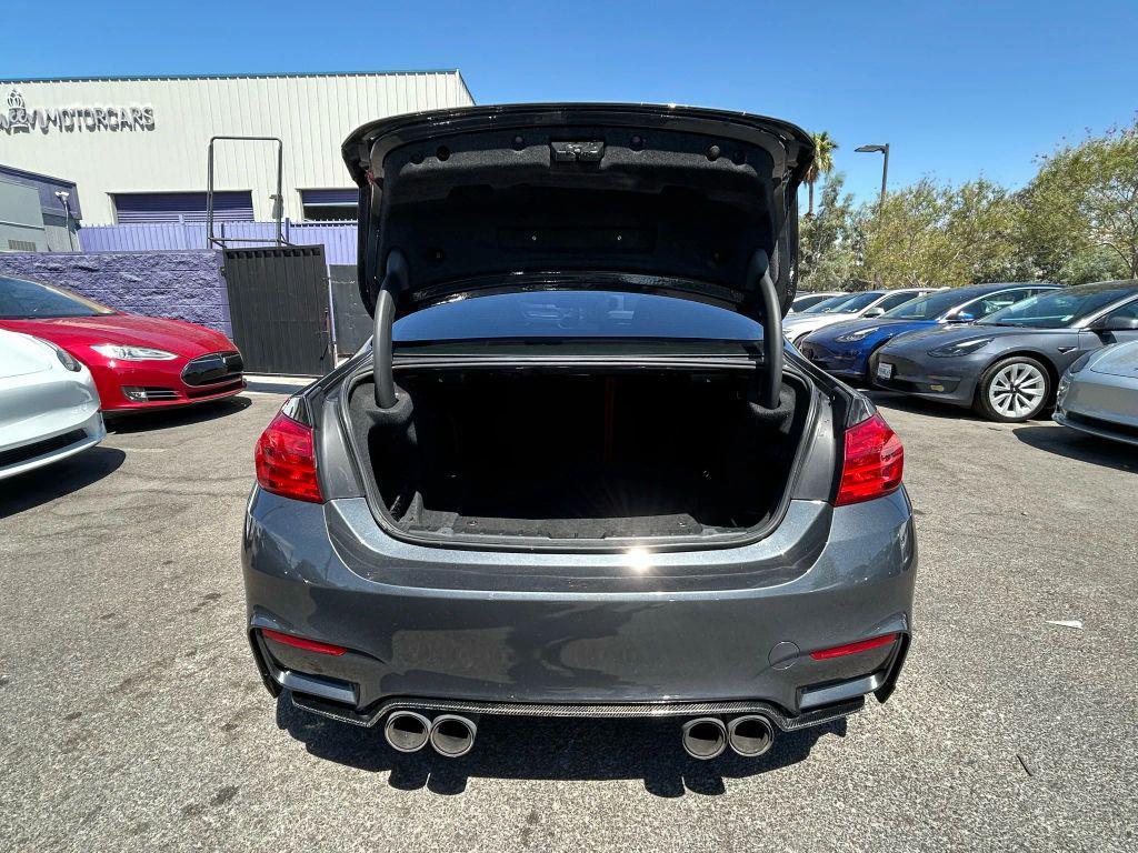 used 2015 BMW M4 car, priced at $27,999