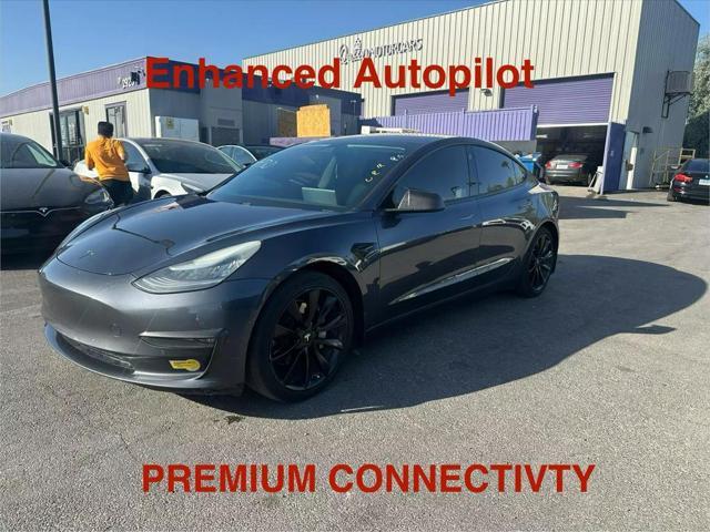 used 2018 Tesla Model 3 car, priced at $15,999